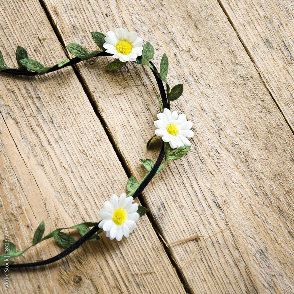 Obraz premium wreath on the head of artificial flowers