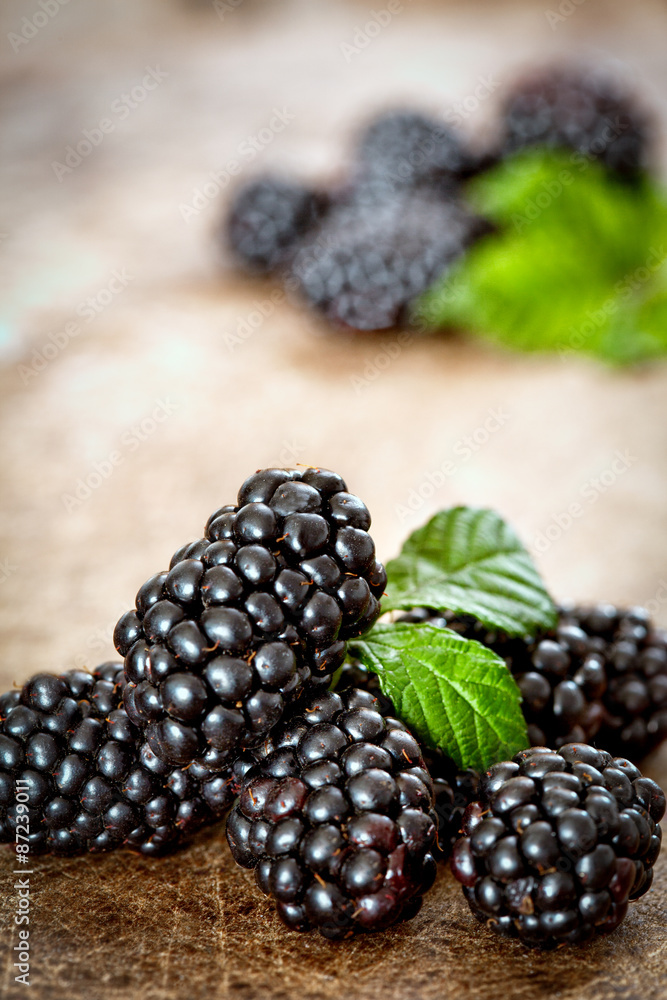 Blackberries on wooden background Blackberries on wooden background