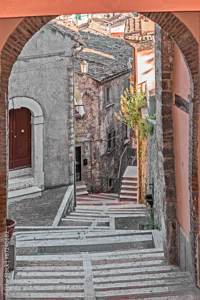 Naklejka premium perspective of stairway in alley 