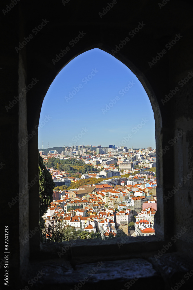 Looking out  from a window of the St. George Castle over the city of Lisbon, Portugal