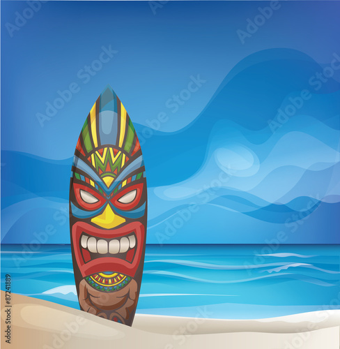 Tiki warrior mask design surfboard on ocean beach