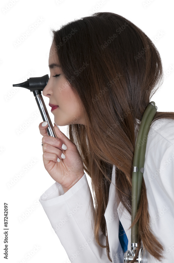 Woman doctor with an otoscope