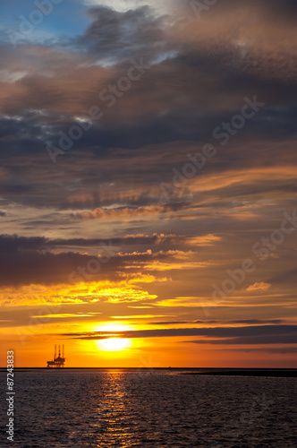 Offshore drilling platform at sunset, Netherlands © TasfotoNL