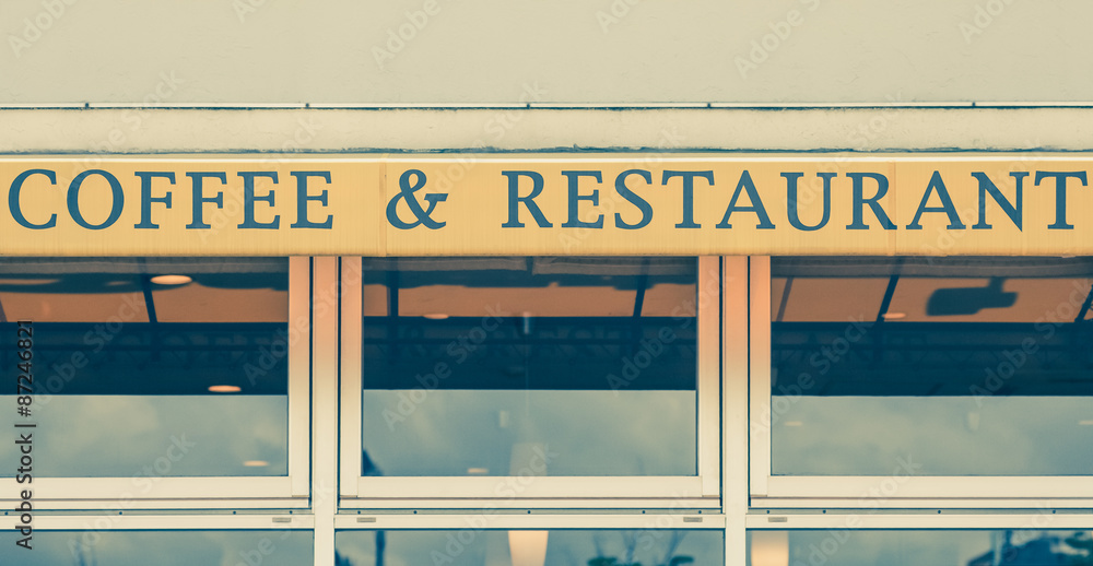Coffee and restaurant signboard in front restaurant