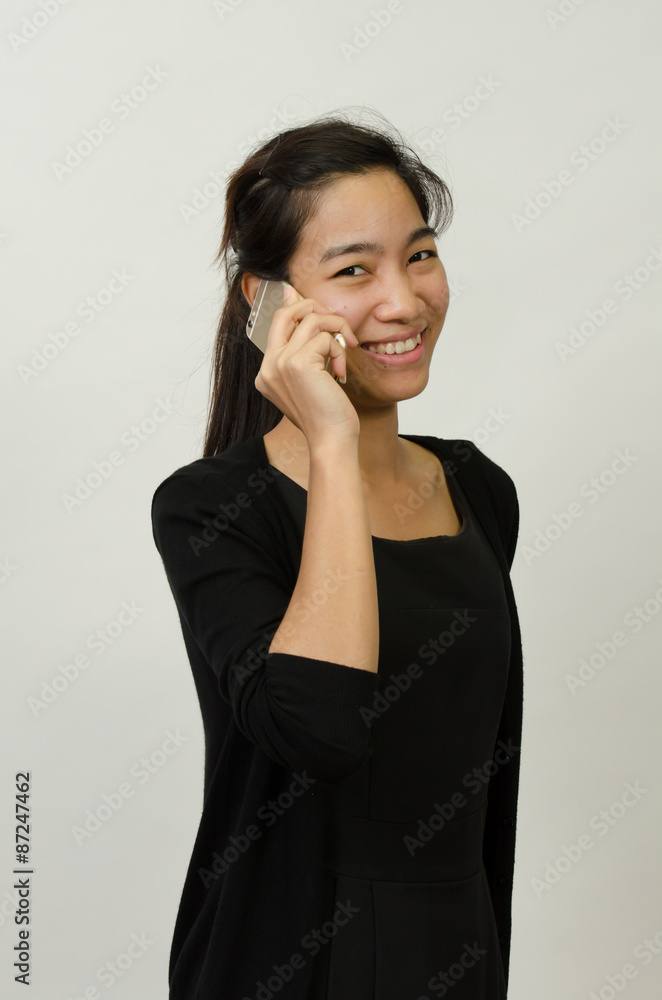 happy confident businesswoman talking on the mobile cell phone isolated on white. happy confident businesswoman talking on the mobile cell phone isolated on white.