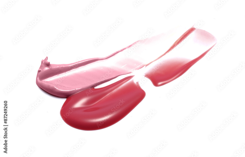 Red and pink lip gloss isolated on white Red and pink lip gloss isolated on white