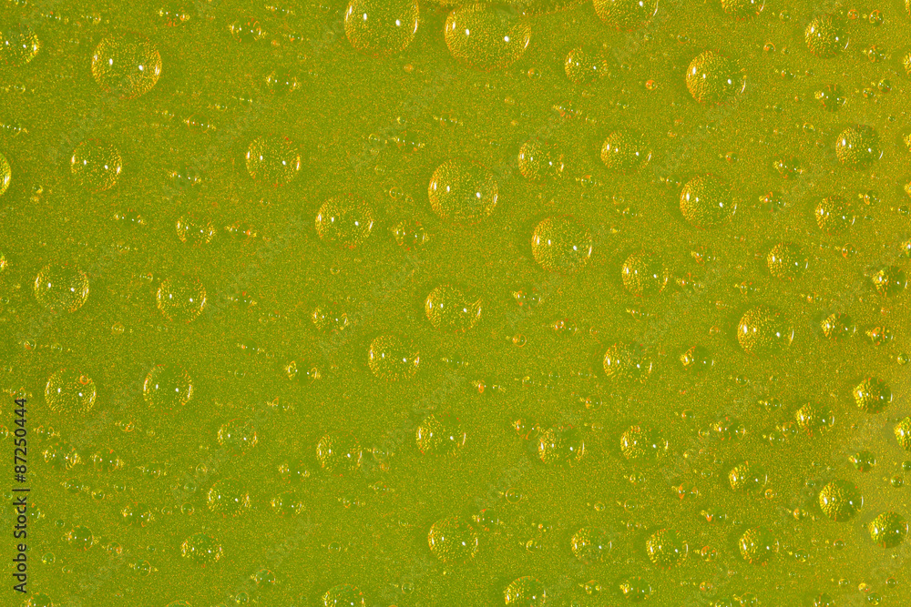 Water drops on the green surface