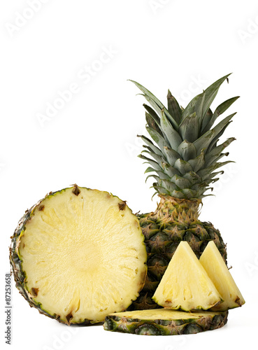 pineapple with slices isolated on white background photo