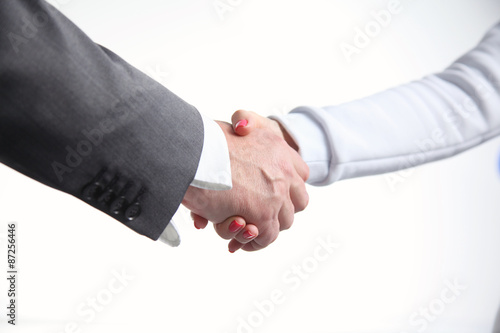 Closeup of a business handshake, on white background