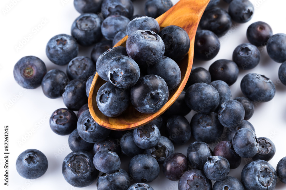 Fresh blueberries in wooden spoon Fresh blueberries in wooden spoon