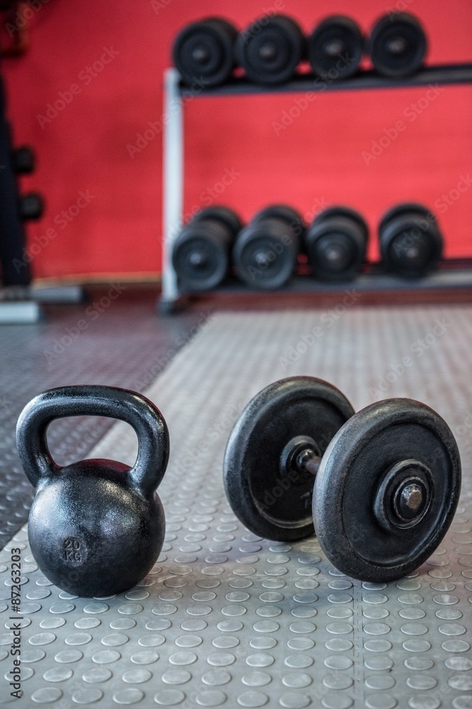 Kettlebell next to dumbbells Kettlebell next to dumbbells