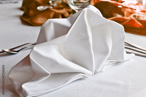 White napkin in table background