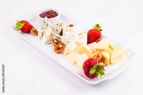 Cheese plate with cheeses Dorblu, Brie, Camembert and Roquefort