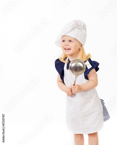 Close up of beautiful girl with kitchen spoon