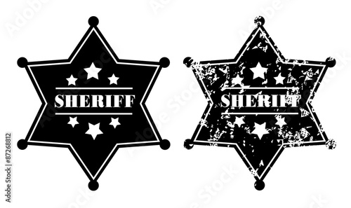 Black sheriff badges on white background photo