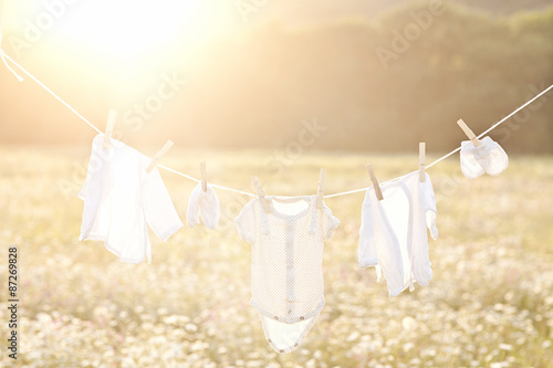 Baby laundry hanging on a clothesline