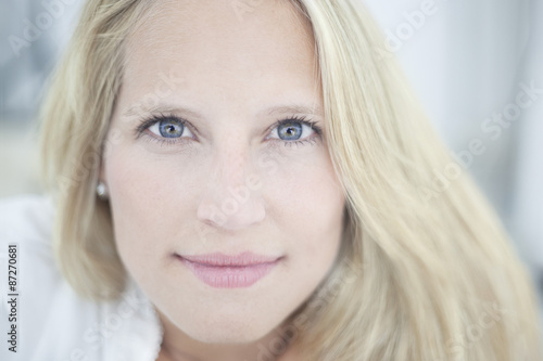 Close/up of blond blue eyes woman