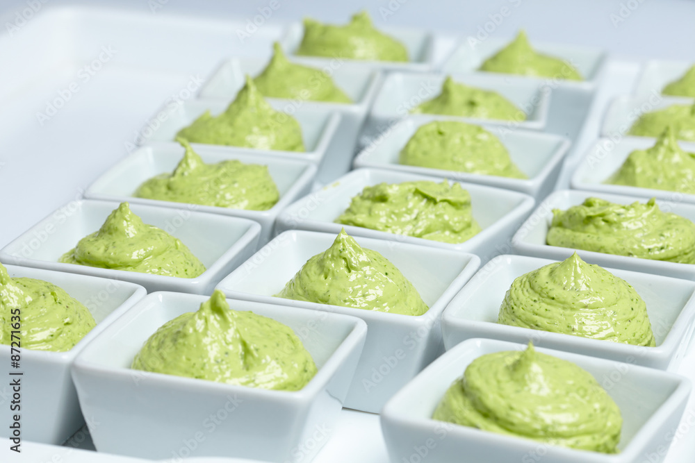 butter mixed with herbs in small plates at the buffet butter mixed with herbs in small plates at the buffet