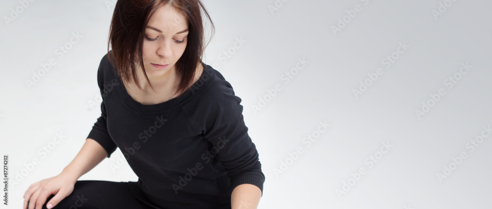 young beautiful woman sitting in lotus position, copy space young beautiful woman sitting in lotus position, copy space