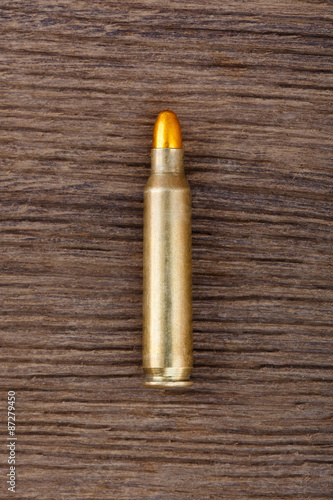 Ammunition, on the wooden table, close-up.