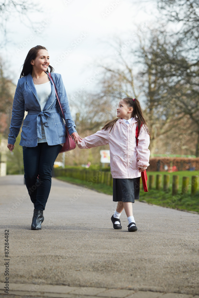 Mother Walking Daughter To School Along Path Mother Walking Daughter To School Along Path