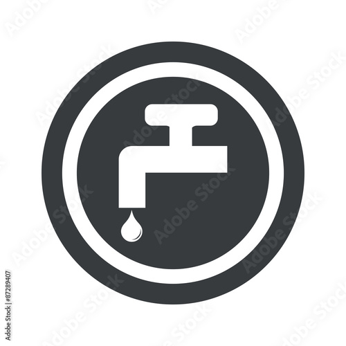 Round black water tap sign
