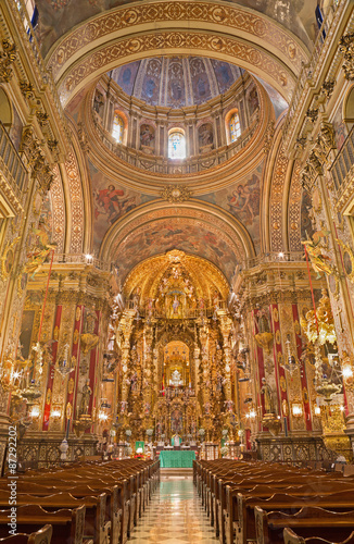 GRANADA  SPAIN - MAY 29  2015  The nave of  baroque Basilica San Juan de Dios with the frescoes by Diego Sanchez Sarabia from second part of 18. cent.