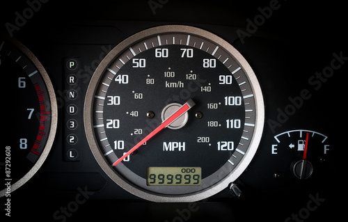 Car dashboard odometer with 999999 miles on it photo