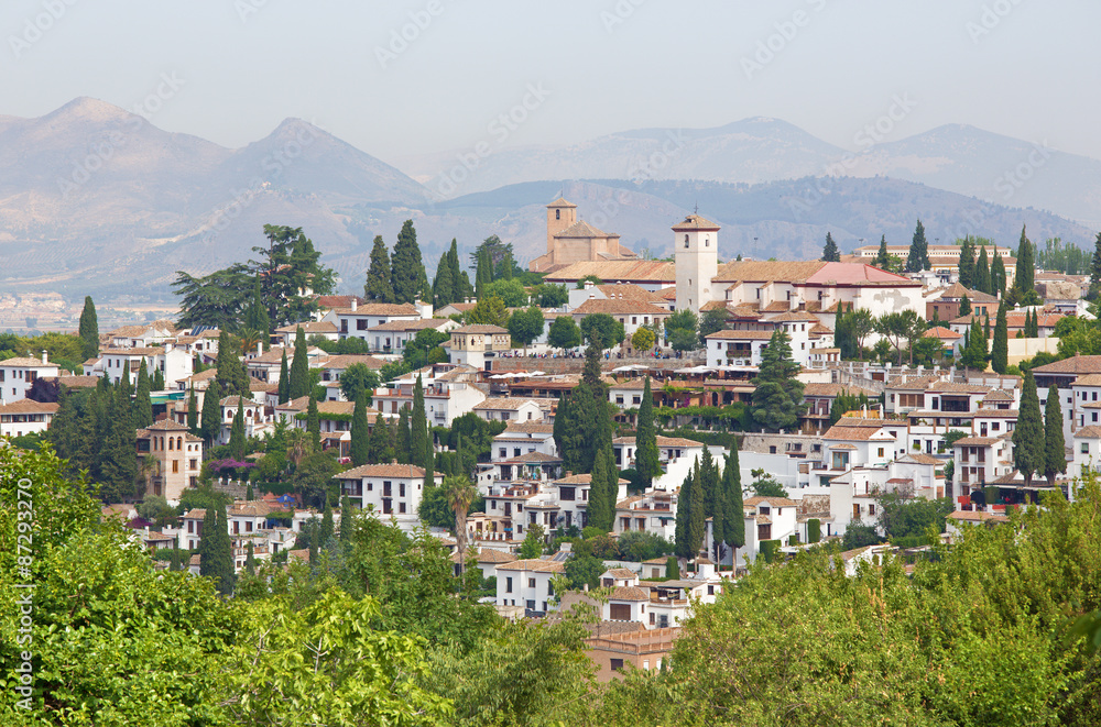 Granada - The look to The Albayzin district and Saint Nicholas church from Generalife gardens of Alhambra palace.