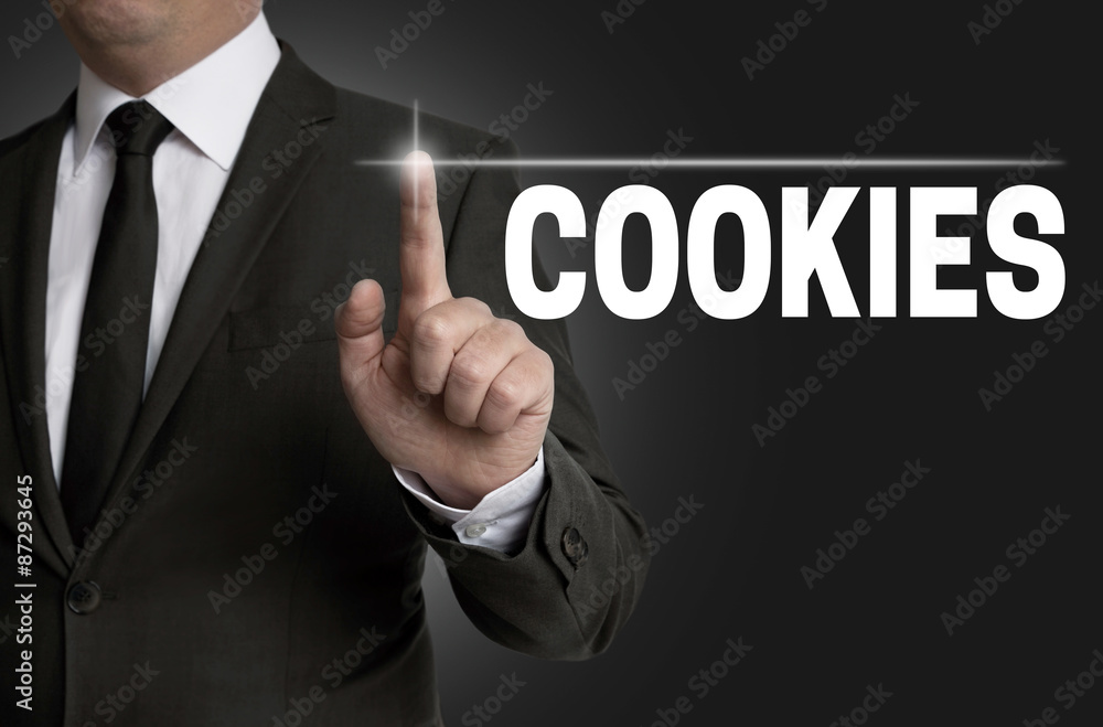 cookies touchscreen is operated by businessman cookies touchscreen is operated by businessman