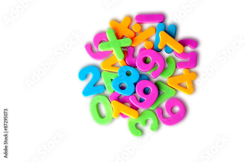 Colorful magnetic digits on refrigerator