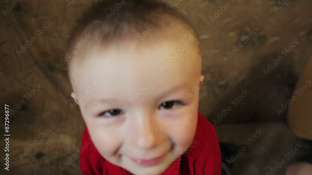happy little boy in a red shirt
happy little boy in a red shirt