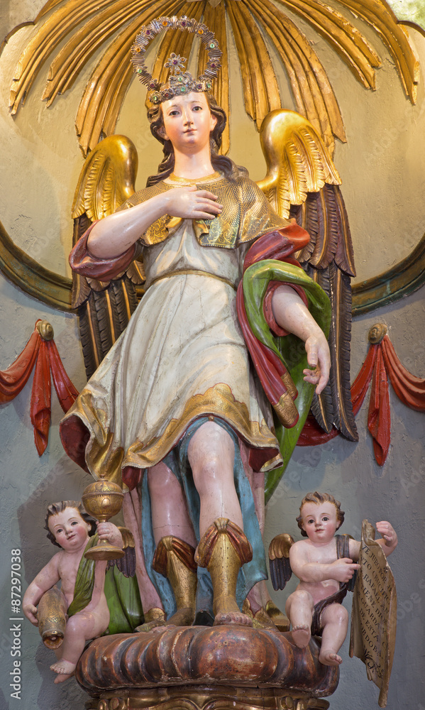 CORDOBA, SPAIN - MAY 26, 2015: The carved and polychrome statue of archangel Raphael in Church Eremita de Nuestra Senora del Socorro on side altar by Alfonso Gomes de Sandoval from 17. cent.