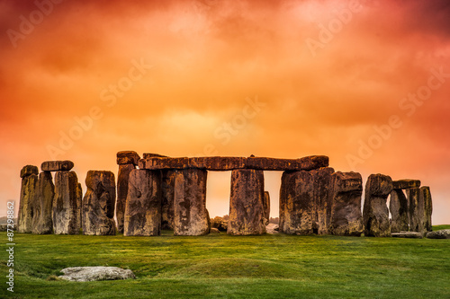 Stonehenge against fiery orange sunset sky