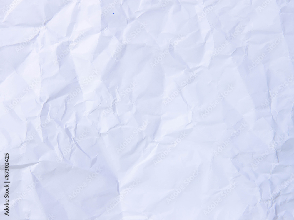 Crumpled paper texture pattern background in light pale blue col Crumpled paper texture pattern background in light pale blue col