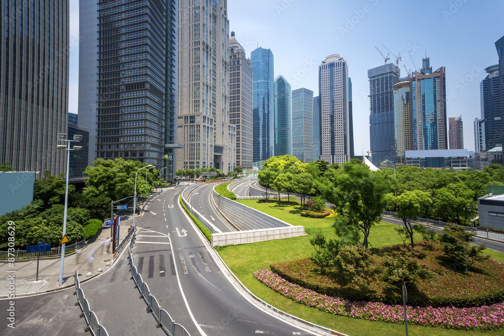 Modern buildings and urban road in city Modern buildings and urban road in city