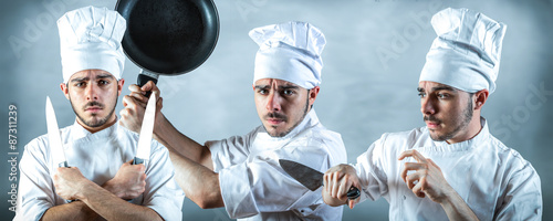Obraz na płótnie tre cuochi aggrassivi in cucina