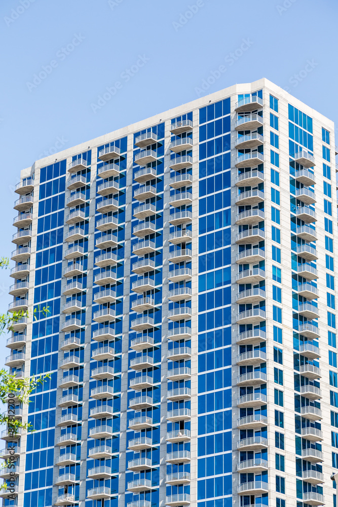 Blue Glass Condo Tower with White Balconies