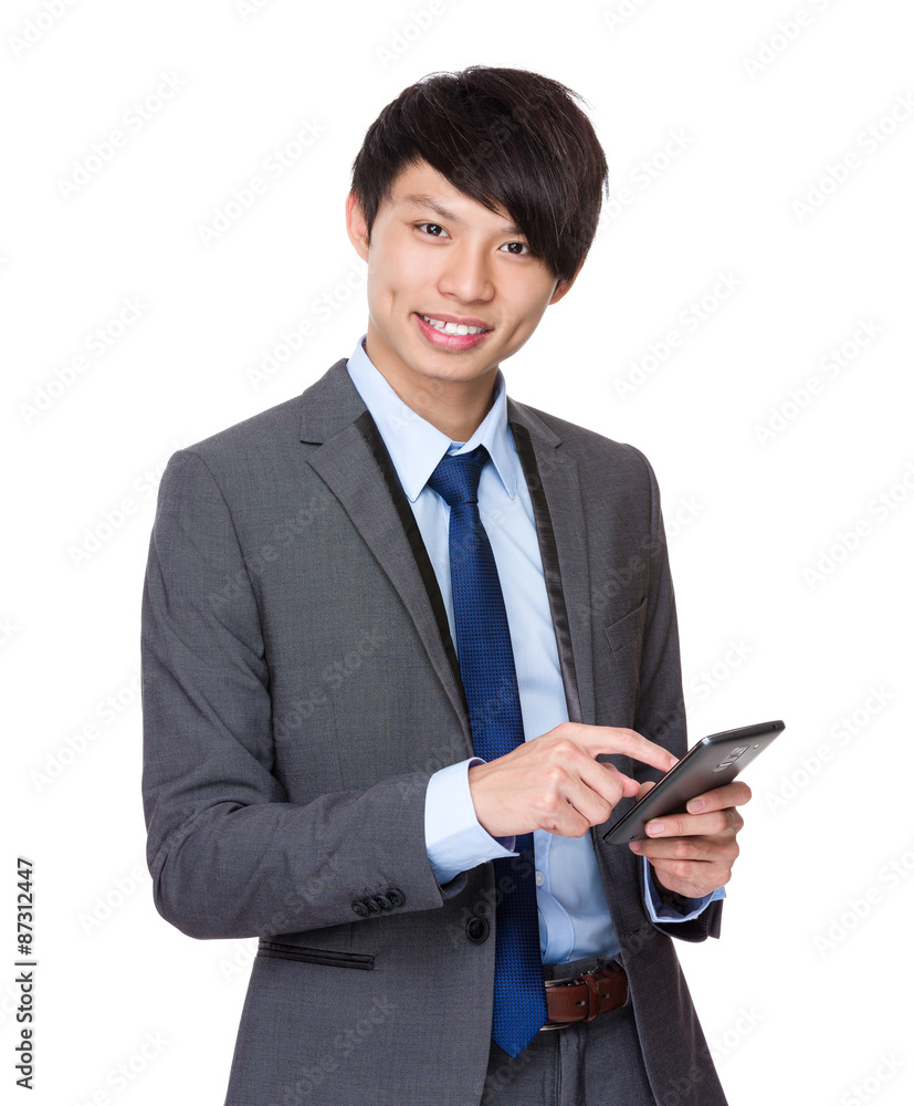 Businessman use of the cellphone Businessman use of the cellphone
