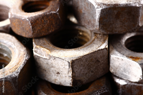 Rusty nuts pile in the workshop