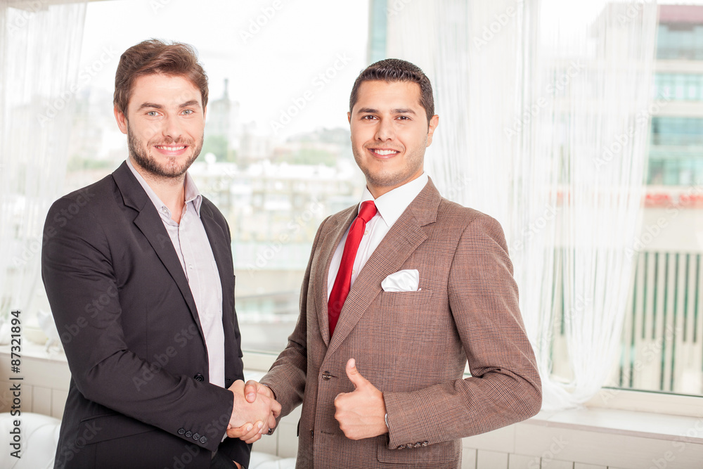 Successful young business partners have built a consensus Successful young business partners have built a consensus