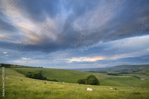 Beautiful Summer sunset landscape Steyning Bowl on South Downs