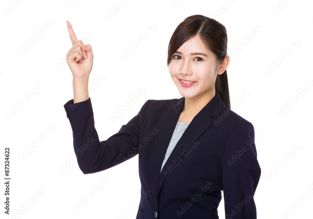 Asian young businesswoman with finger point up Asian young businesswoman with finger point up