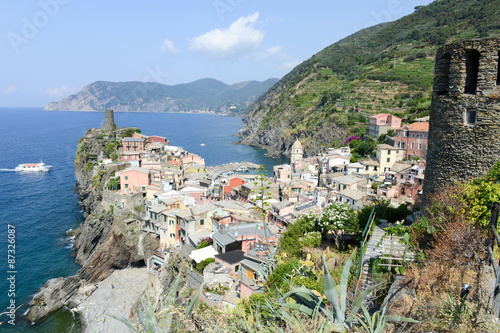 Scenic view of colorful village Vernazza and ocean coast