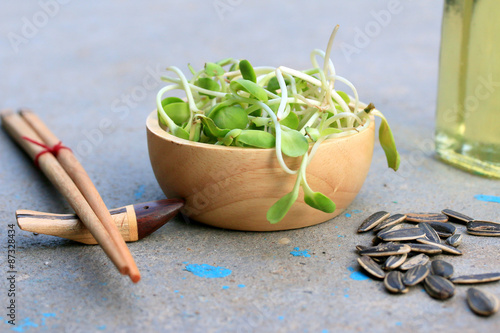 Sunflower oil and young green seedlings.