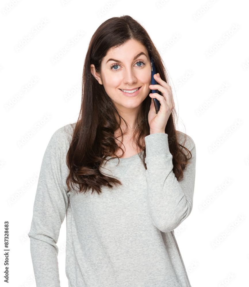 Brunette woman talk to mobile phone Brunette woman talk to mobile phone