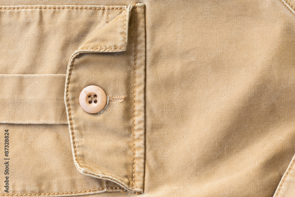 front pocket on brown shirt textile texture background front pocket on brown shirt textile texture background