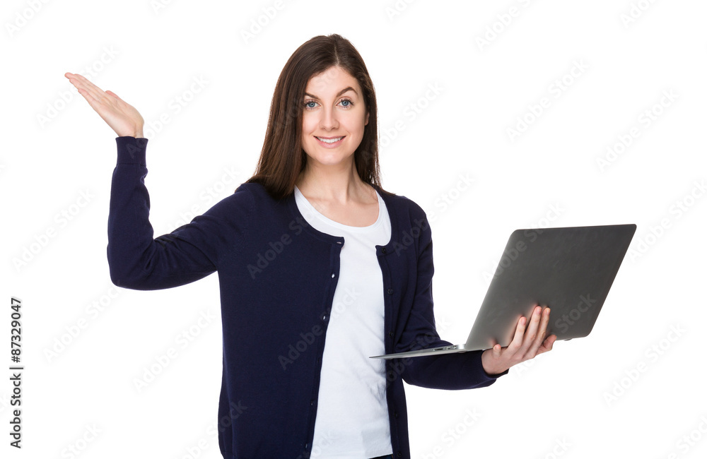 Caucasian woman use of notebook computer and open hand palm Caucasian woman use of notebook computer and open hand palm