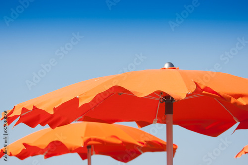 Umbrellas and sunbeds in Beach, Italy © kleem26