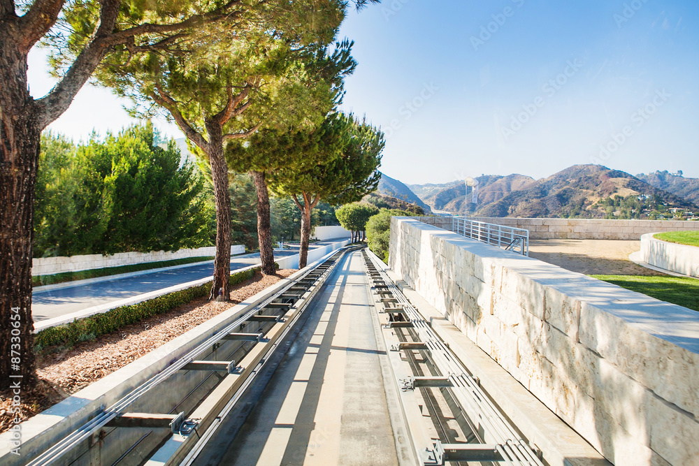 Fototapeta premium Funicular rails against backdrop of the mountains In Los Angeles